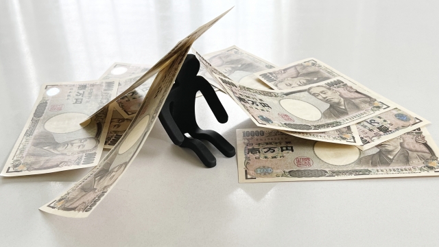 一万円札に潰される。品川区で借金返済の無料相談ができます